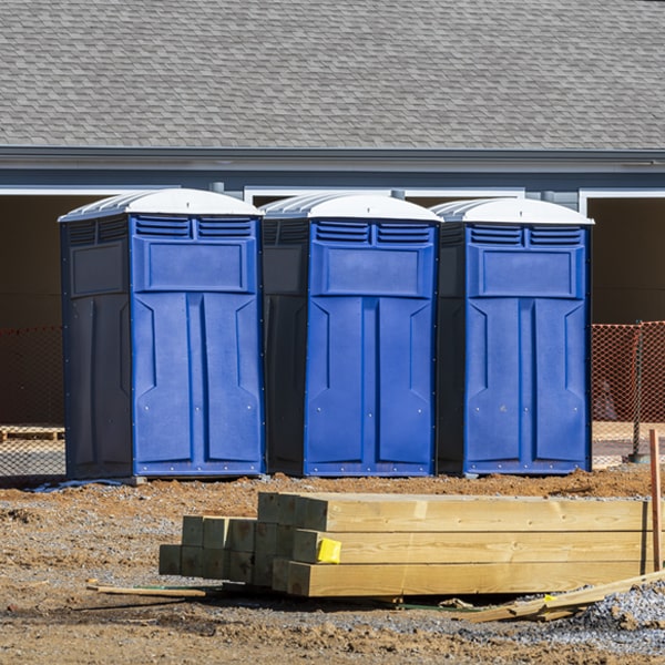 what is the cost difference between standard and deluxe portable toilet rentals in Raymondville Missouri